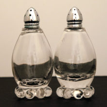 The Candlewick shaker set is two full-size salt and pepper shakers with the 8-ball bottle foot.