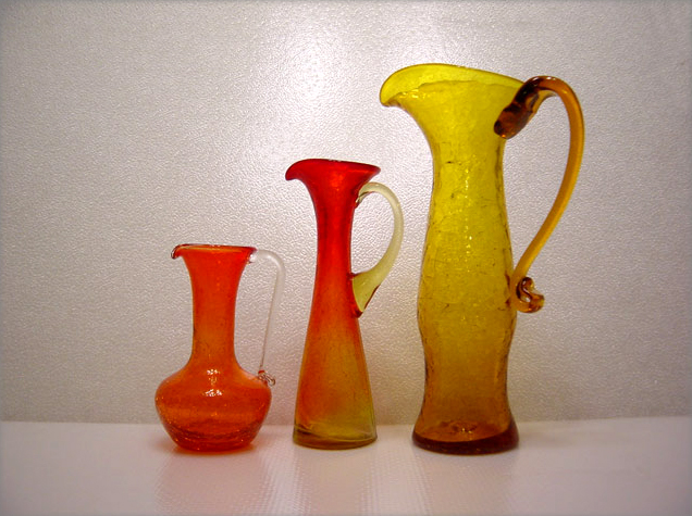 Hand tooled spout measures 8" tall on a 2.5" base.