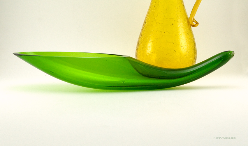 The Blenko Art Glass horn vase is hard to find, and especially hard to find in the rare color of 'Lime'.