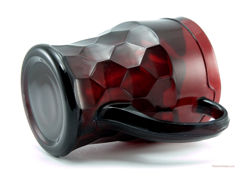 Royal Ruby Depression glass pitcher made of heavy, quality pressed glass in the honeycomb pattern, circa 1930's.