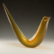 Solid glass 4.25 lb stylized bird.