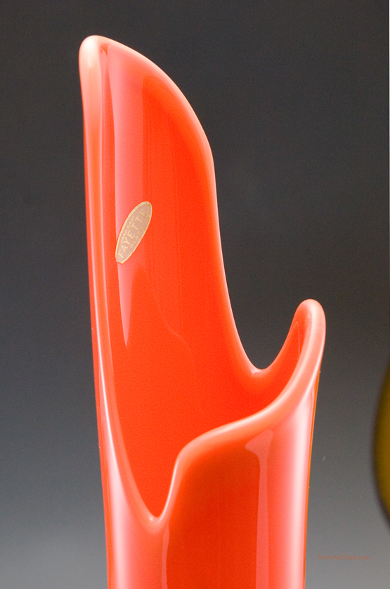 This eccentric retro modern vase commands attention. It's tall, measures 17.26" high. Can accommodate an armful of flowers or grasses.