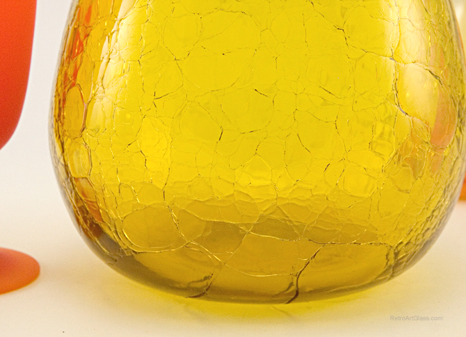 Beautiful lemon colored heavy vintage glass hand-blown and then dipped in cold water while still hot to produce the surface crackle decor.