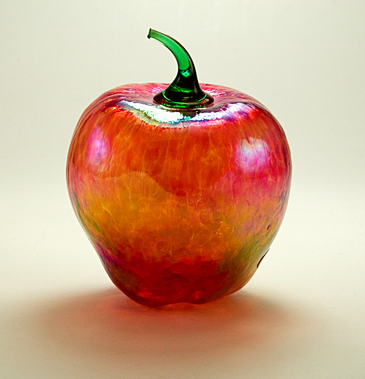 By Glass Eye Studio produced this better than life-like art glass apple in reds and golds.
