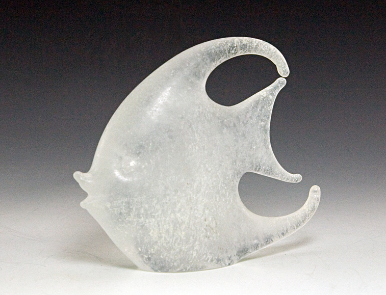 'Scavo' in Italian means 'Excavation'. The scavo finish was developed to imitate ancient Roman glass discovered during excavations. The ancient glass, buried for hundreds to thousands of years, had a rough matte finish in whites and greys, sometimes with splashes of other colors. This exquisite angel fish is whitish/grey with a ghosty aura.