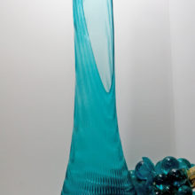This giant floor vase stands 31" tall. Very large. Shown in main image with mid-century giant grapes.