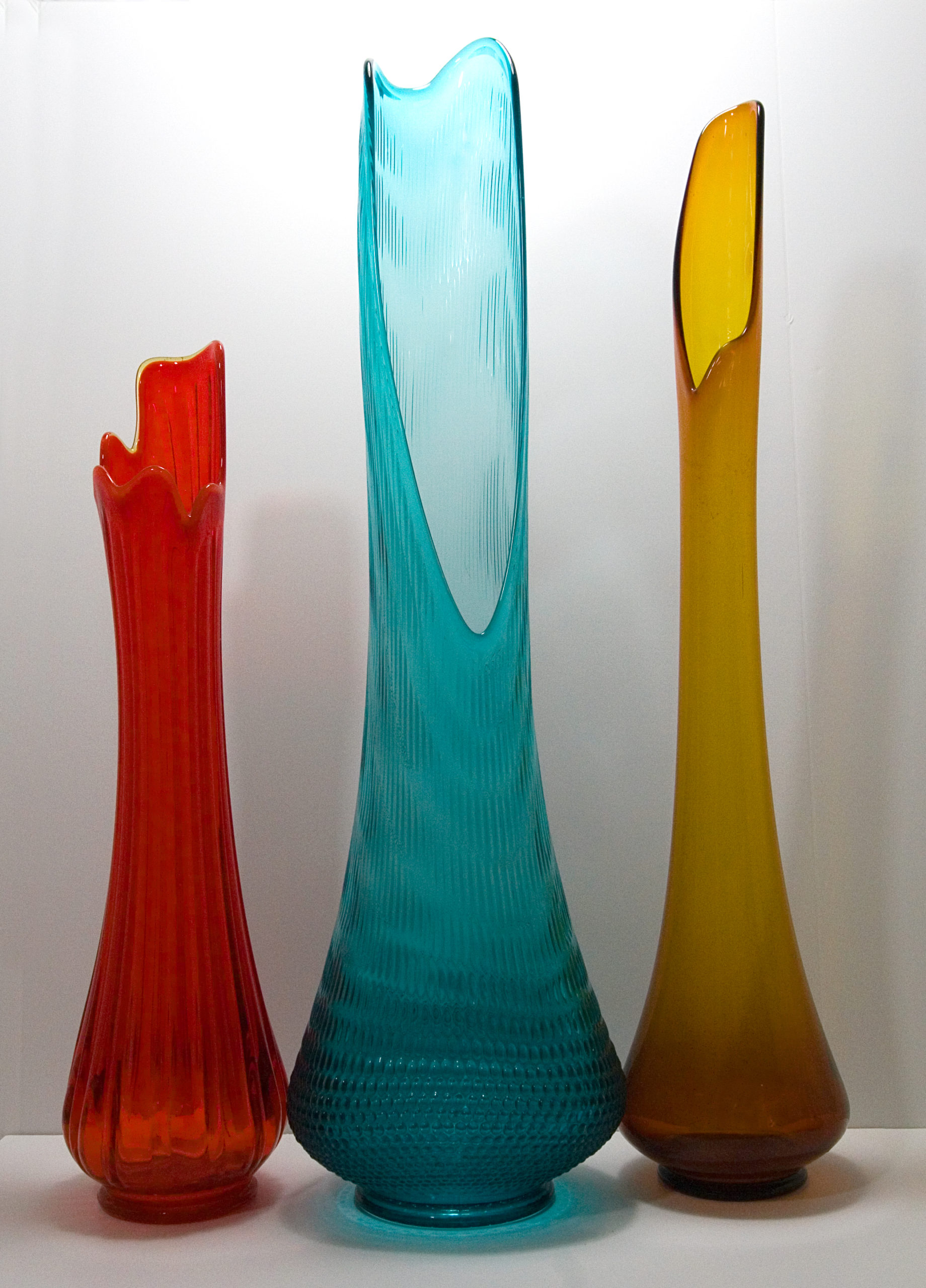 Three large and lovely handmade art glass vases designed to sit on the floor. USA circa 1960's - 1970's