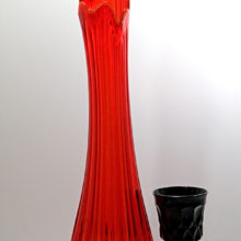 Retro glass floor vase in Persimmon, a deep intense orange color with hints of yellow and red.