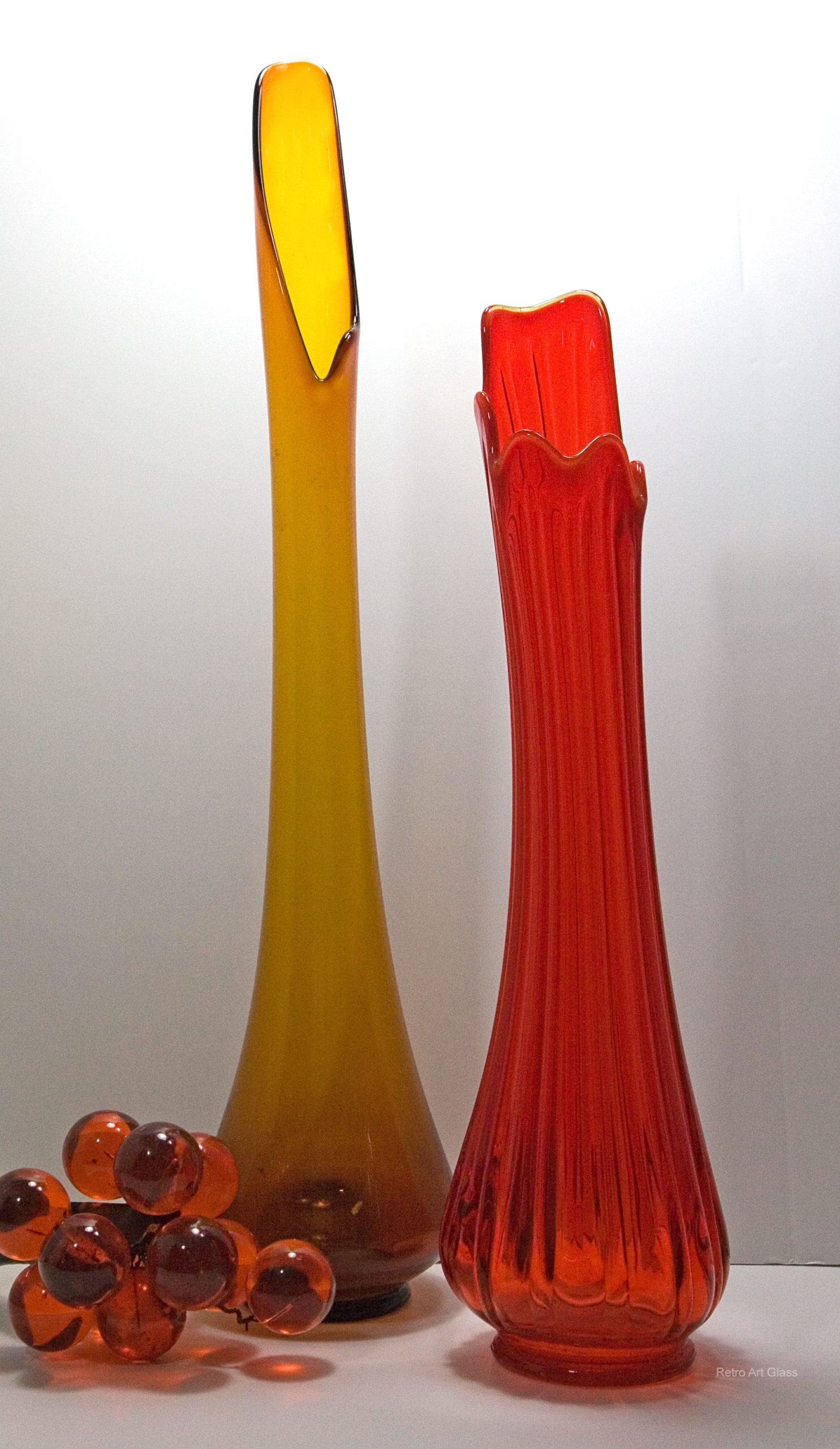 Pair of very tall glass floor vases made in the Mid-20th century