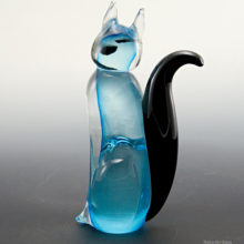 In like-new condition with some wear on the sticker. This cat is a contemporary made figurine