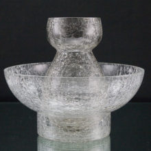 Hyacinth vase and bowl are in fine crackle, accomplished by dipping the hot formed glass in cold water.