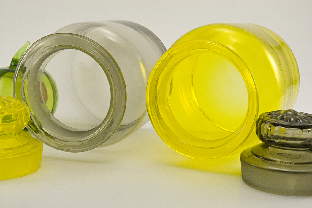 Hollow daisy lids are hand-ground to fit the hand-ground necks. The lid and the vessel are hand-blown from a base mold. Rims are hand-finished.