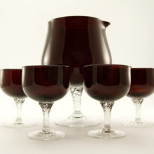 Set of Mid-Century Modern glass cocktail pitcher and four goblets.