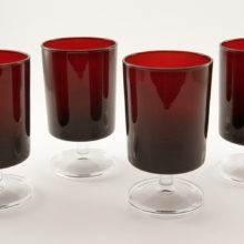 Set of four vintage ruby glass goblets marked France.