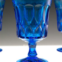 Thick heavy quality vintage glass. The goblets weigh one pound each. Sturdy and well-made.
