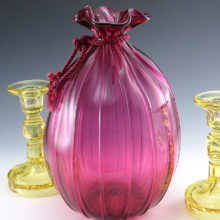 Pre-1970 production. Fenton added an impressed logo on items made after 1970. This bag vase does not have an impressed logo.