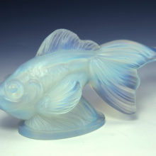 The Art Deco crowd fell hard the beautiful, haunting color and Sabino provided it in popular forms of the day. Japanese decor was all the rage, and this Japanese fish fit their decor taste perfectly.