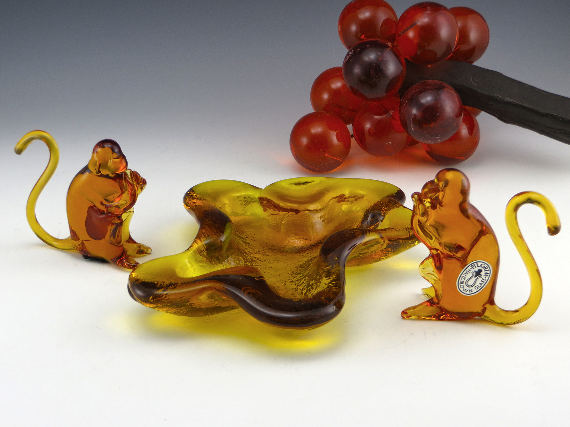 Mid-20th Century figurines by Pilgrim art glass. Scarce monkey figurines both in excellent shape with labels.