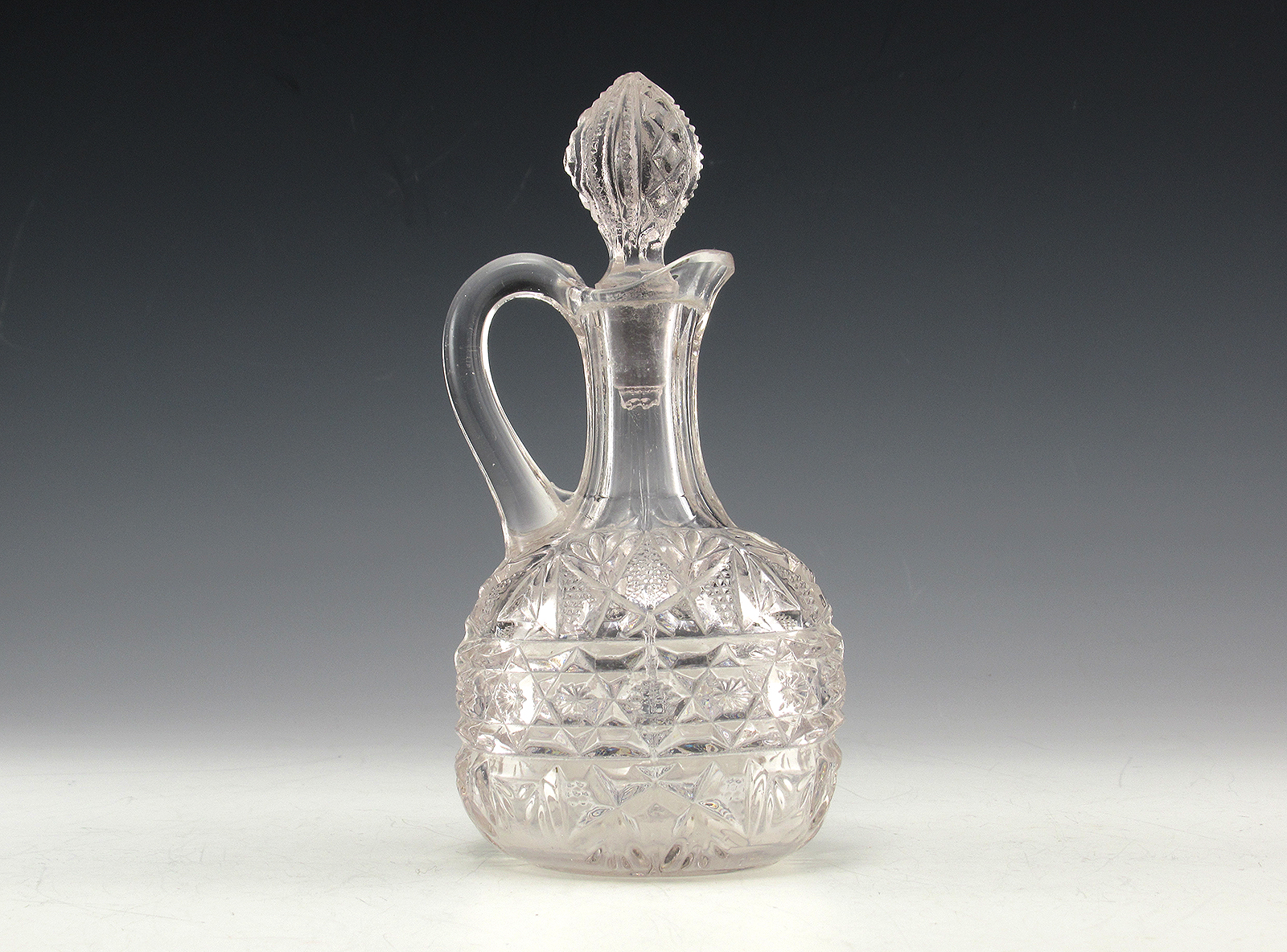 Early American Glass was made during the Victorian period circa 1850-1910. Hundreds of glass factories in the U.S. produced thousands of patterns in semi-mass production with the help of John Bakewell's invention of the glass pressing machine.
