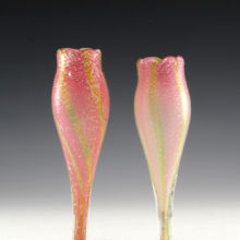 Made of quality cased crystal. Inner layer of pink and green color with sparking silver aventurine. The vases are thick-walled with drawn stems.