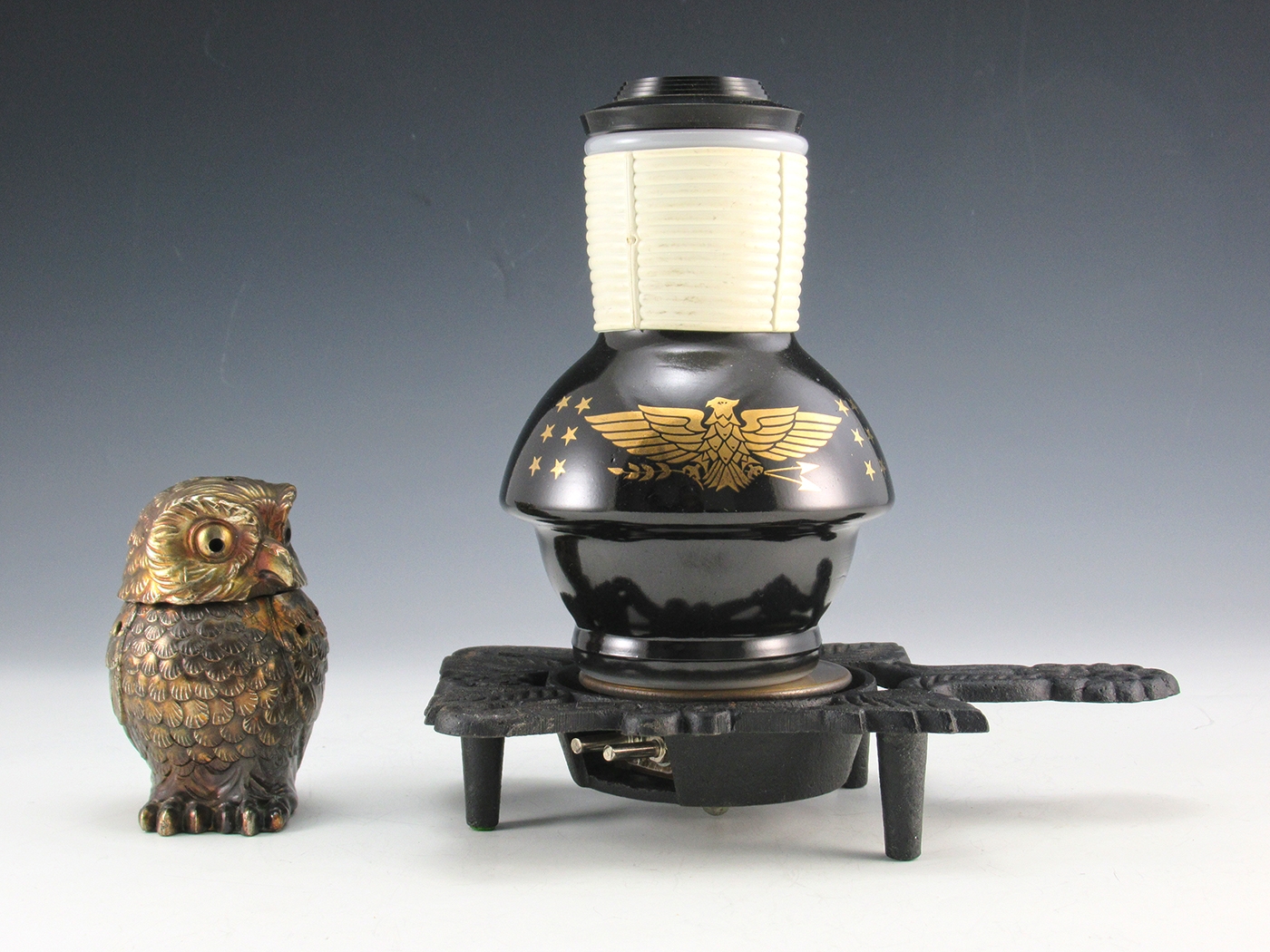 Beverage warmer set by ElecTrivit and McKee Glasbake, circa 1940's to 1950's. Both items made in the U.S.A. The iron ElecTrivit in unused in original box.