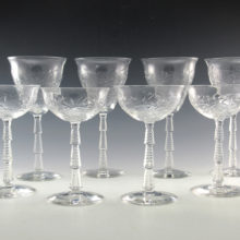 Quality Art Deco cut crystal stemware set of eight; (4) water/wine goblets and (4) dessert, cocktail or champagne goblets. The crystal blanks were made in the 1930's by Libbey and decorated by Cataract-Sharpe which had been cutting crystal decor since 1918. This luxurious leaded crystal with superior cut decor is known as Libbey Rock Sharpe.