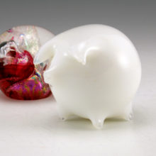 Cute Pairpoint Glass Company pig with original Pairpoint sticker still attached. Stylish little figurines like this were used back in the day to decorate and perk table conversation at the dining table. Also called "Whimseys".