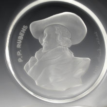 The P.P. Rubens portrait decor is a very detailed deep acid etched carving. The surface of the plate is smooth, the deep etch decor shows through from the reverse. Wonderful 3-D effect. Beautiful artwork.
