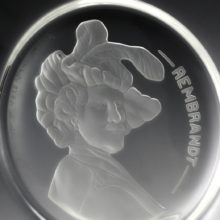 The Rembrandt portrait decor is deep acid etched from a very detailed carving. The surface of the plate is smooth, the deep etch decor shows through from the reverse. Wonderful 3-D effect. Beautiful artwork.