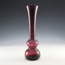Amethyst glass retro modern bud vase. Featuring a double bubble base allowing for more water storage and better stability...and a great retro look.