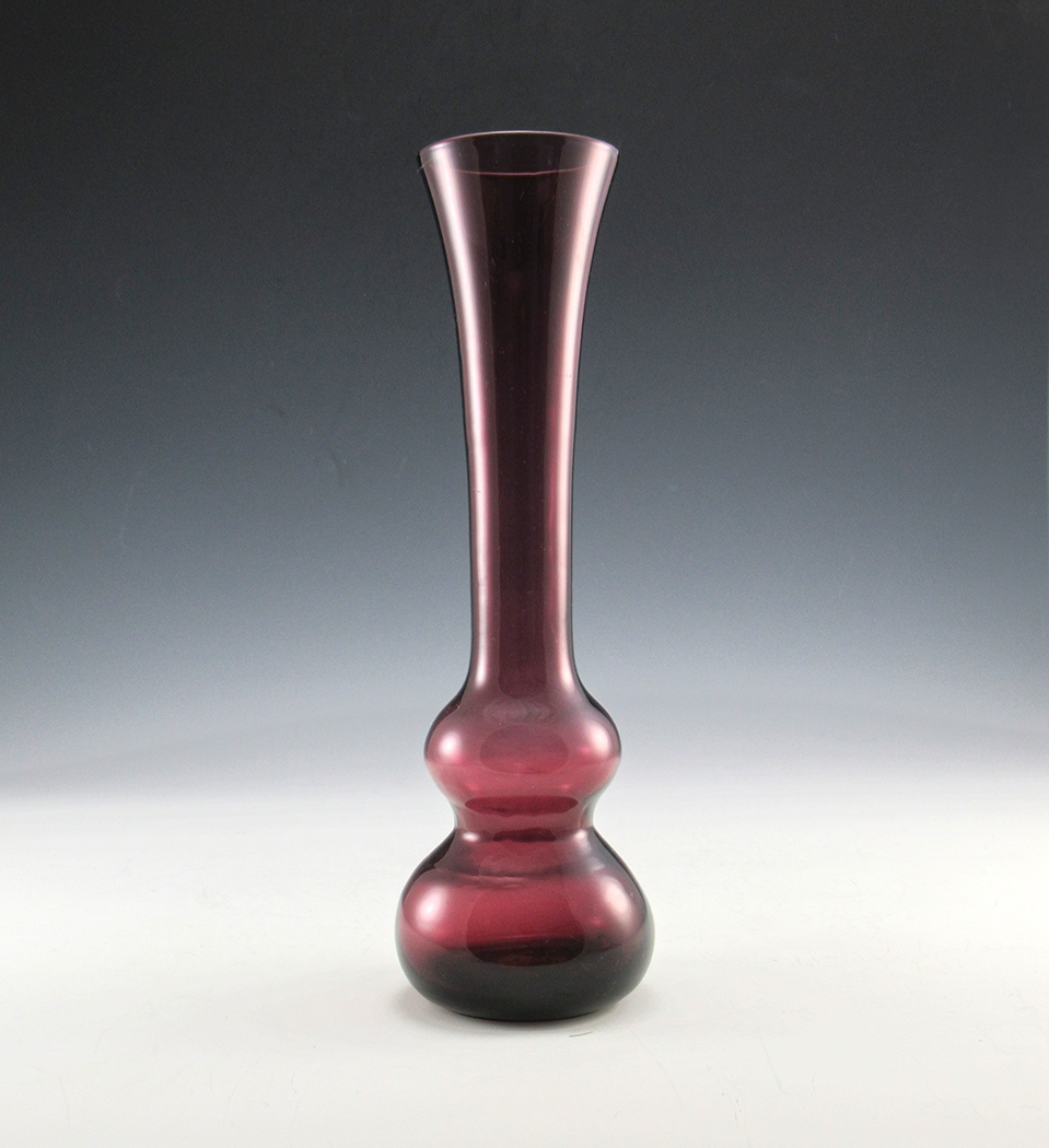 Amethyst glass retro modern bud vase. Featuring a double bubble base allowing for more water storage and better stability...and a great retro look.
