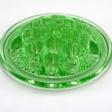 Large antique L.E. Smith Uranium glass flower frog was made in the 1920's to 1930's for assistance in flower arranging. The surface of the frog dome has little squiggly lines resembling hay.