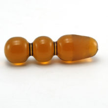 Hand-formed amber glass stopper measures 3" long. Solid glass. Made in the U,S.A. during the Mid-Century Modern decor period (1940's to 1970's) by Rainbow Art Glass. This stopper was made for Rainbow's small bottles and jugs but will work with any bottle or jug that fits.
