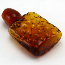 Hand-blown decanter stopper measures 4" long. Made in the U,S.A. during the Mid-Century Modern decor period (1940's to 1970's). Probably made by Blenko Art Glass.