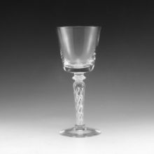 Vintage air twist stem wine glass. Maker unknown. Steuben glass is best known for their air twist stemware and other bar ware.