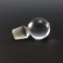 Small crystal ball stopper made of solid glass with a few trapped air bubbles in the ball. In excellent condition.