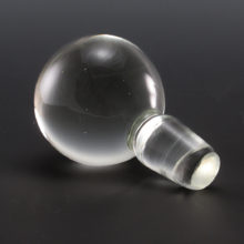 This big solid crystal ball stopper will go well with any colorless or colored glass bottle or jug. The crystal ball stopper is In excellent condition.