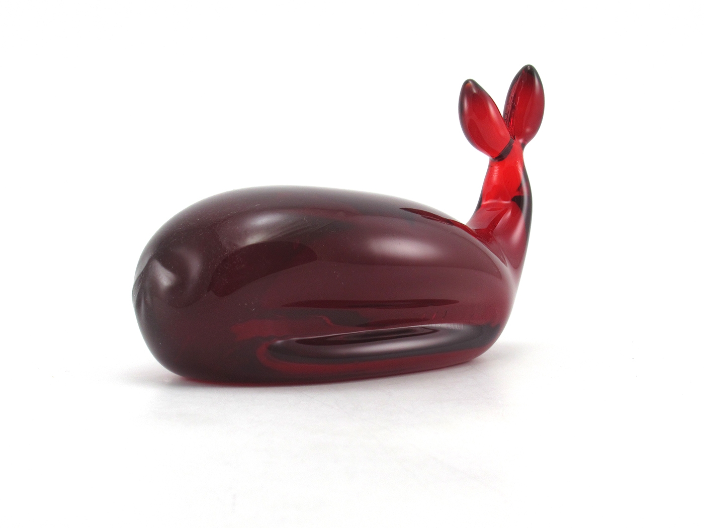 Beautiful quality ruby red glass. Ruby is a most desired, and rarely found color in this form. Perfect gift for a marine-life fan and/or whale collector.