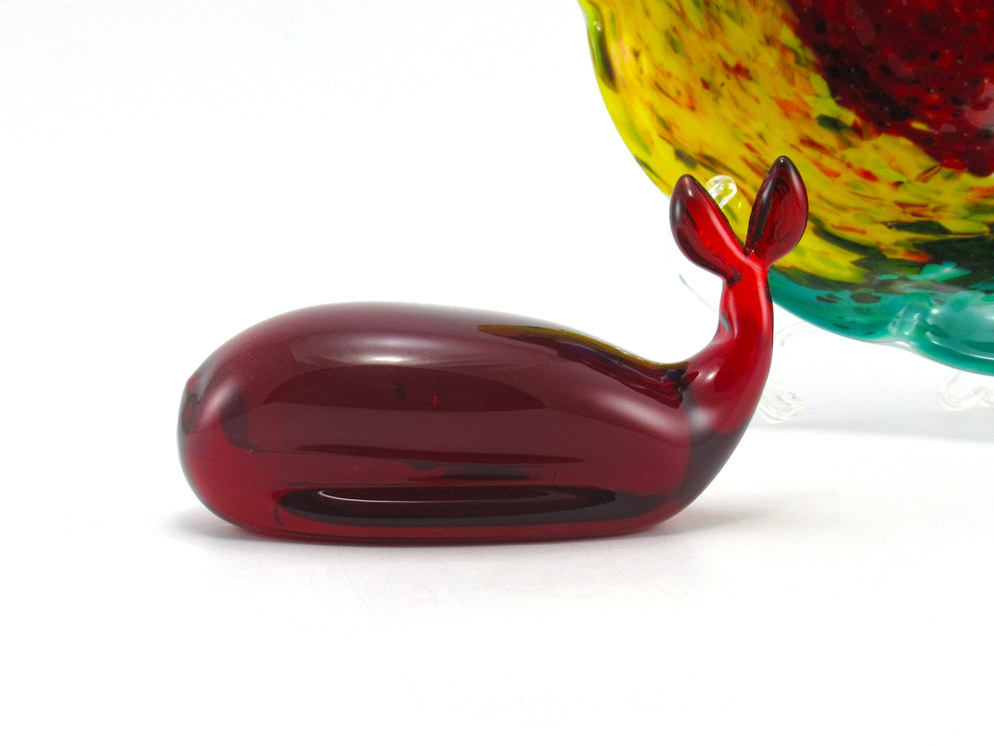 Hand-formed authentic studio art glass by Viking, 1960's. Measures 5¼" long, 2½ wide, 3½" tall and weighs 1.4 lbs. In excellent condition.