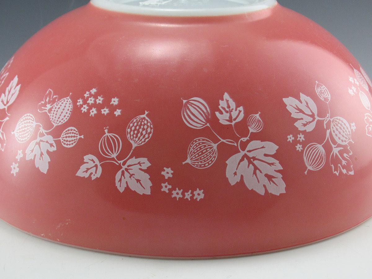 In use for approximately 60 years, most of these mixing bowls show major scratching. This bowl is as bright as the day it was made and has minimal surface scratching. Must look close to find.