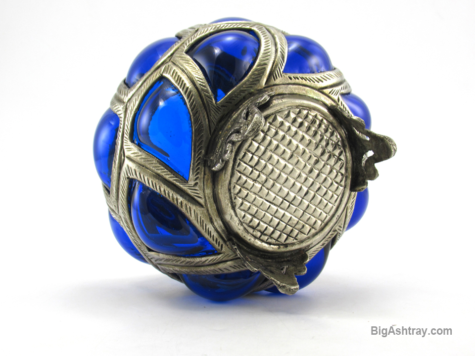 The metal is solid, not plated. It is non-ferrous metal, a magnet will not stick to the metal.