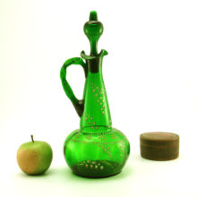 Victorian glass decanter in emerald green with hand-applied enamel decor. Large Handled jug with original stopper. Antique decanter with enamel decor, probably of Bohemian (French or Czech) or English origin. Signed "L".