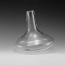 Large colorless glass mushroom stopper for decanter.