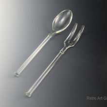 Depression Glass fork and spoon serving utensils.