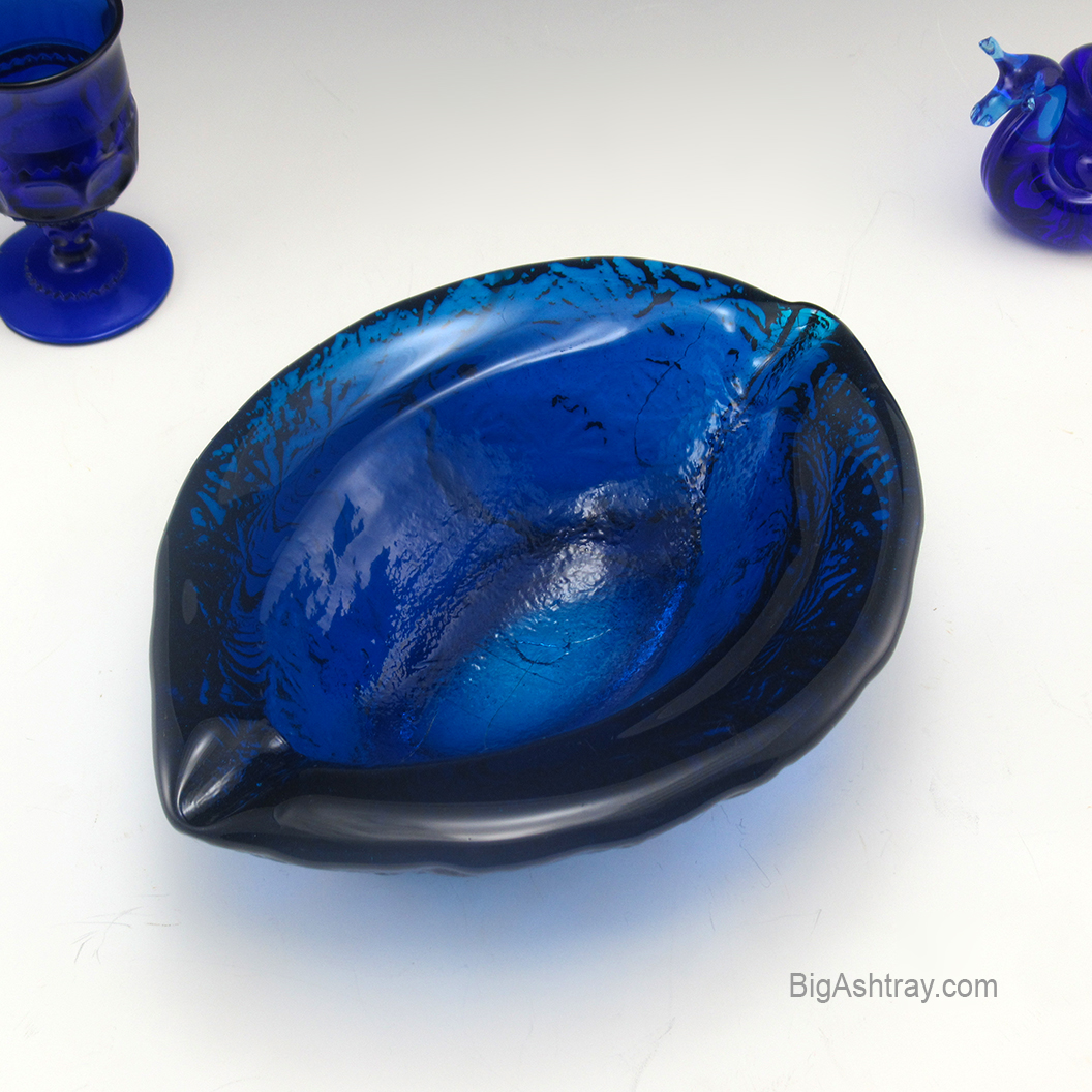 Rare pattern in a very rare shape. Produced for only two years. Designed by Joel Myers. Hand-made with thick Turquoise glass, called Blenko Blue by collectors.