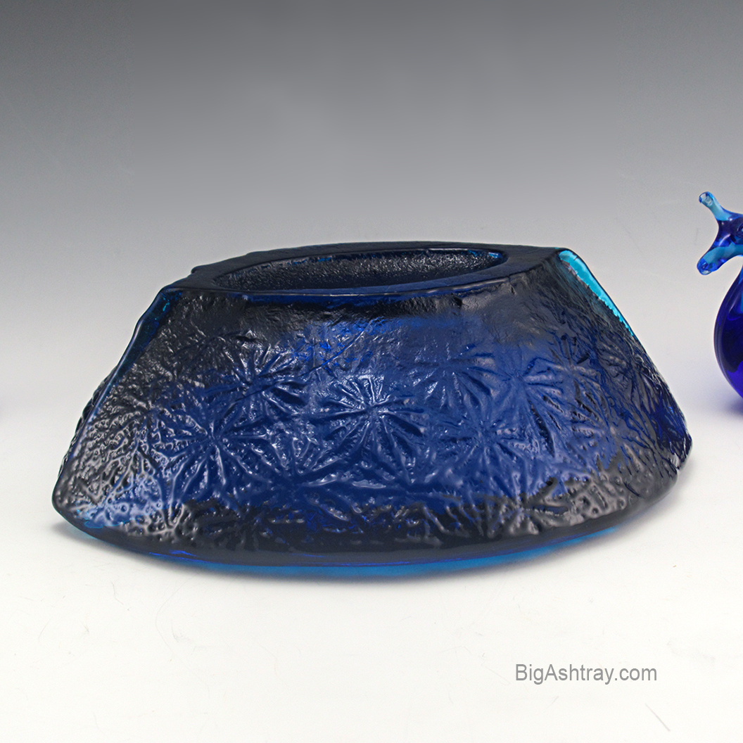 Rarely seen Blenko Art Glass boat bowl in raised rayed pattern.